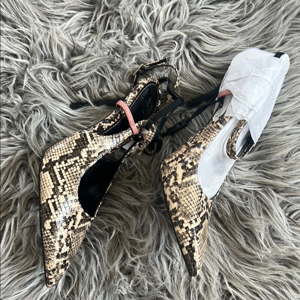 Chic Cream and Black Snakeskin Heels